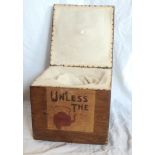 A vintage wooden teapot box with motto decoration and lined interior