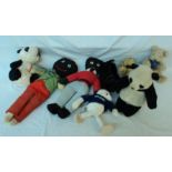 A collection of soft toys, including pandas, lamb, etc.