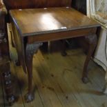 A 24 1/2" 19th Century drop-leaf table with moulded edge, set on acanthus cabriole legs with claw