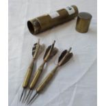 An early 20th Century set of three brass and wood darts in brass tube