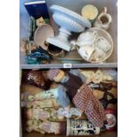 Two boxes containing a quantity of continental figurines, a Poole Pottery dolphin and other