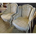 A pair of painted wood part show framed fauteuil armchairs with studded button back upholstery,