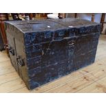 A 33" antique ebonised and studded iron bound silver chest with twin flanking heavy iron drop