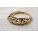 An 18ct. gold five stone diamond ring