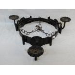 A Gothic style iron three branch light fitting