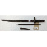 A M1917 US Army bayonet in dug up condition - sold two other objects