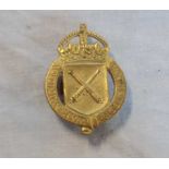 A First World War Munition Volunteer badge, numbered 31290