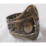 An early 20th Century Chinese white metal buckle pattern clasp bracelet with profuse pierced and