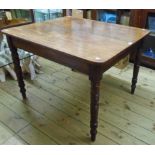 A 3' 6" 19th Century mahogany draw-frame dining table with single leaf, set on ring turned legs