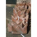 Thirty terracotta crown top edging tiles