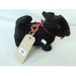 A vintage Scottish terrier soft toy