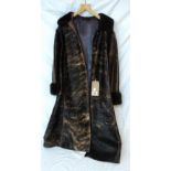 A vintage pony hair and leather coat