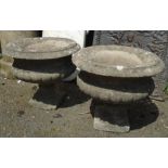 A pair of 15" high precast garden urns