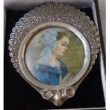 A marked 800 white metal framed and marcasite style framed polychrome printed portrait miniature
