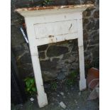 A 24" Victorian painted cast iron fire surround