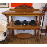 A 4' Victorian polished oak buffet with ornate pierced raised back and two moulded surfaces, set
