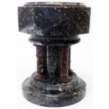 A 19th Century two colour serpentine table font with octagonal top and four pillars, set on