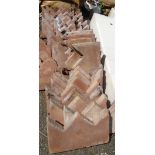 Thirty terracotta crown top edging tiles