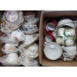 A box containing a quantity of decorative tea cups and saucers - sold with Royal Doulton Countess