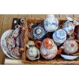 A box containing a collection of modern Oriental ceramics including plates, ginger jars, etc.