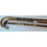 Two 1950's Alpenstock souvenir walking sticks with badges - sold with a walking stick/flute