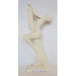 A 21" white painted plaster statue of a nude woman