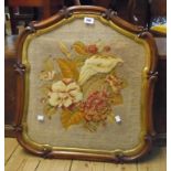 A 19th Century walnut framed and gilt slipped pole screen with C-scroll border and beadwork