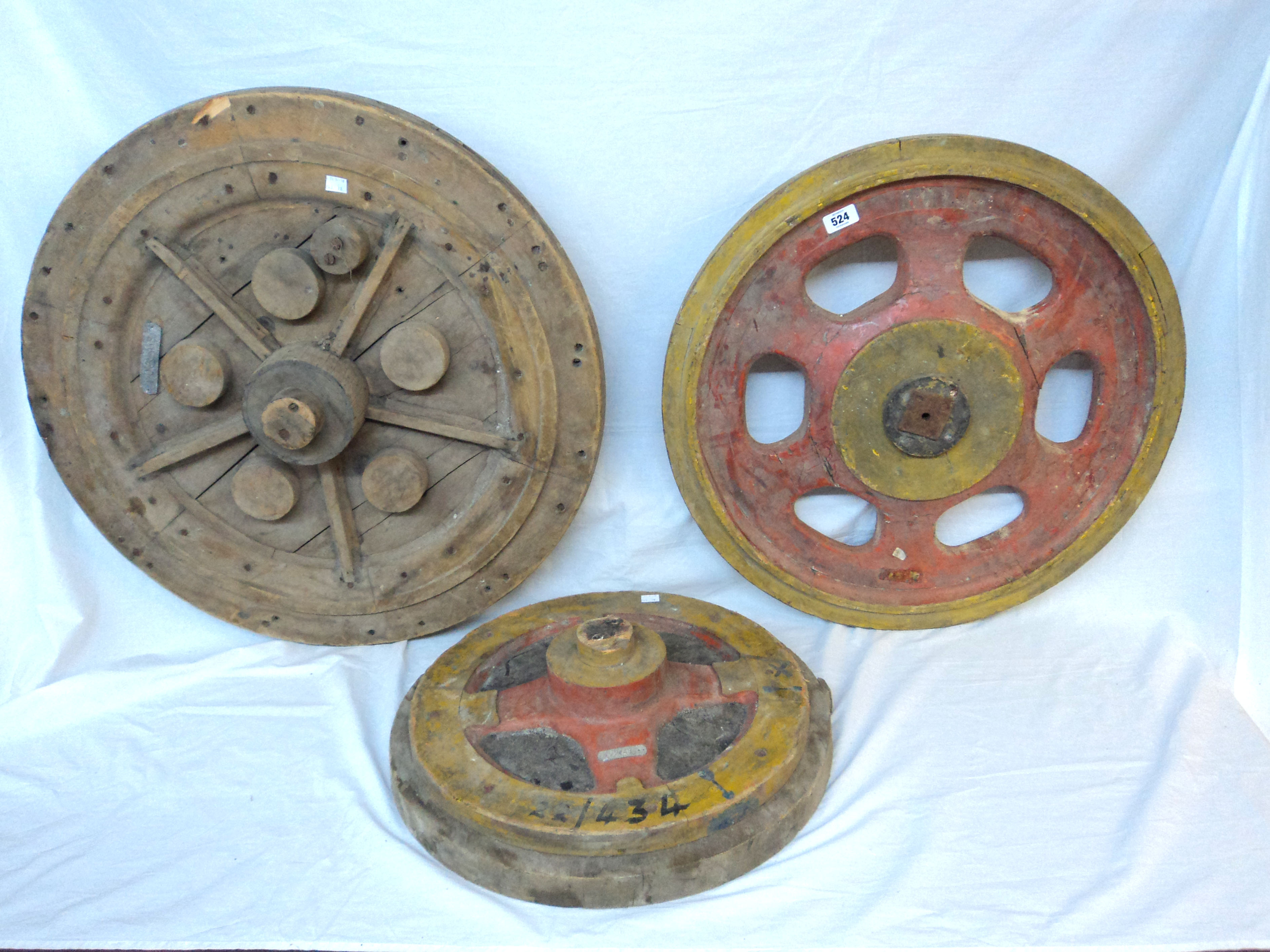 Three old wood drive wheel formers - various sizes