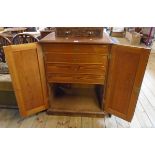 A 28 1/4" Victorian polished pitch pine collector's cabinet with four internal drawers enclosed by a