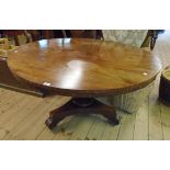 A 4' 2 1/2"" diameter 19th Century walnut breakfast table, set on faceted tapered pillar and trefoil