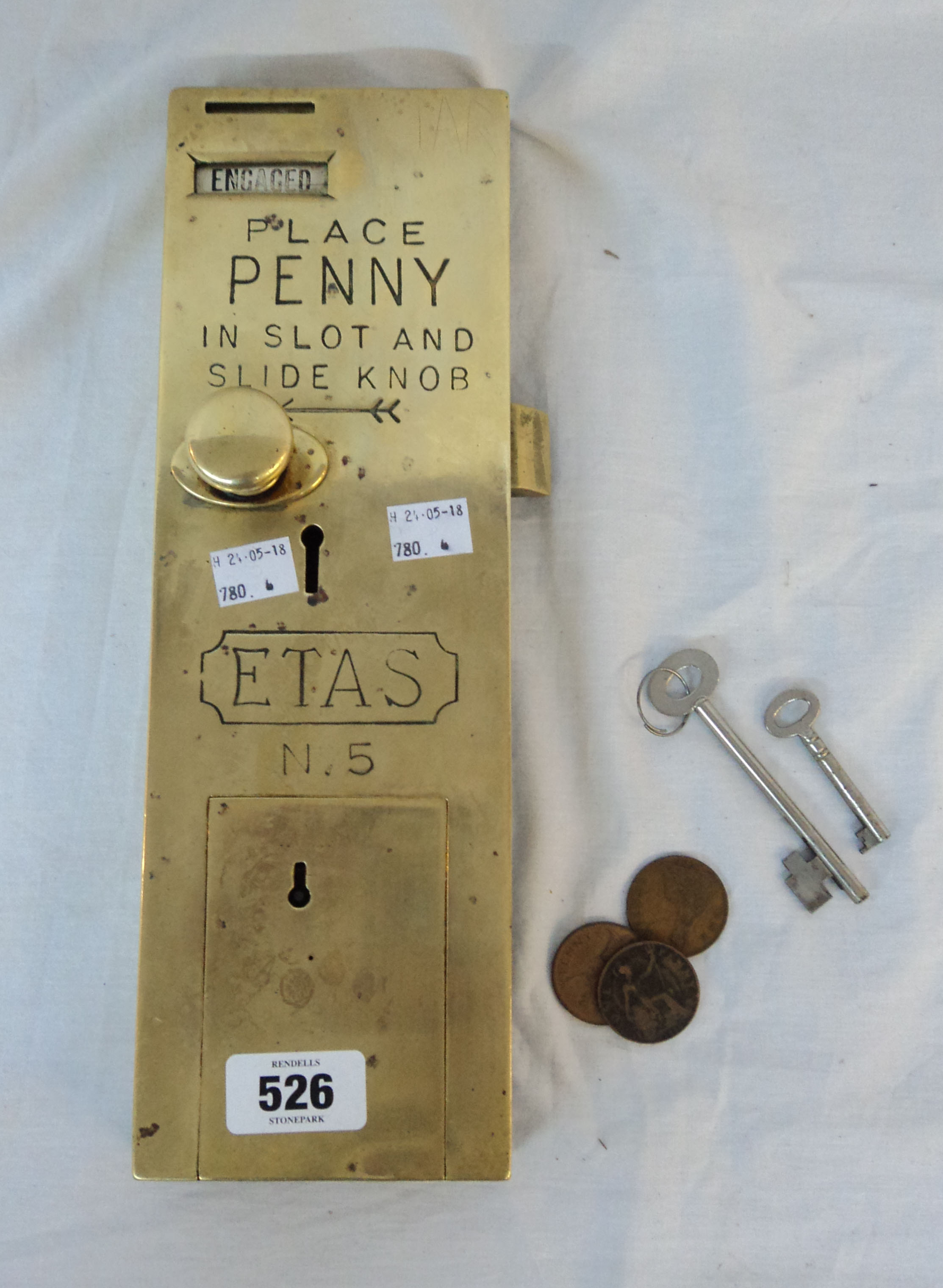 A vintage brass coin operated 'Penny in the Slot' toilet door lock - a/f