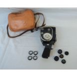A cased Quarz M 8mm clockwork cine camera and accessories