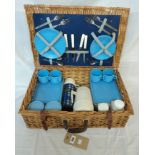 A quantity of wicker items including picnic basket, log basket, etc.