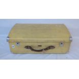 A tin suitcase with pigskin effect finish