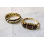 A 9ct. gold three stone garnet ring - sold with a 9ct. eternity ring