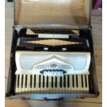 A cased Calvi Parma piano accordion