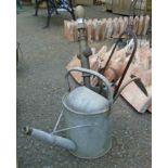 An old watering can, etc.