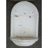 A wall mounted arched wall bracket