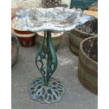 An Art Nouveau style painted cast iron bird bath