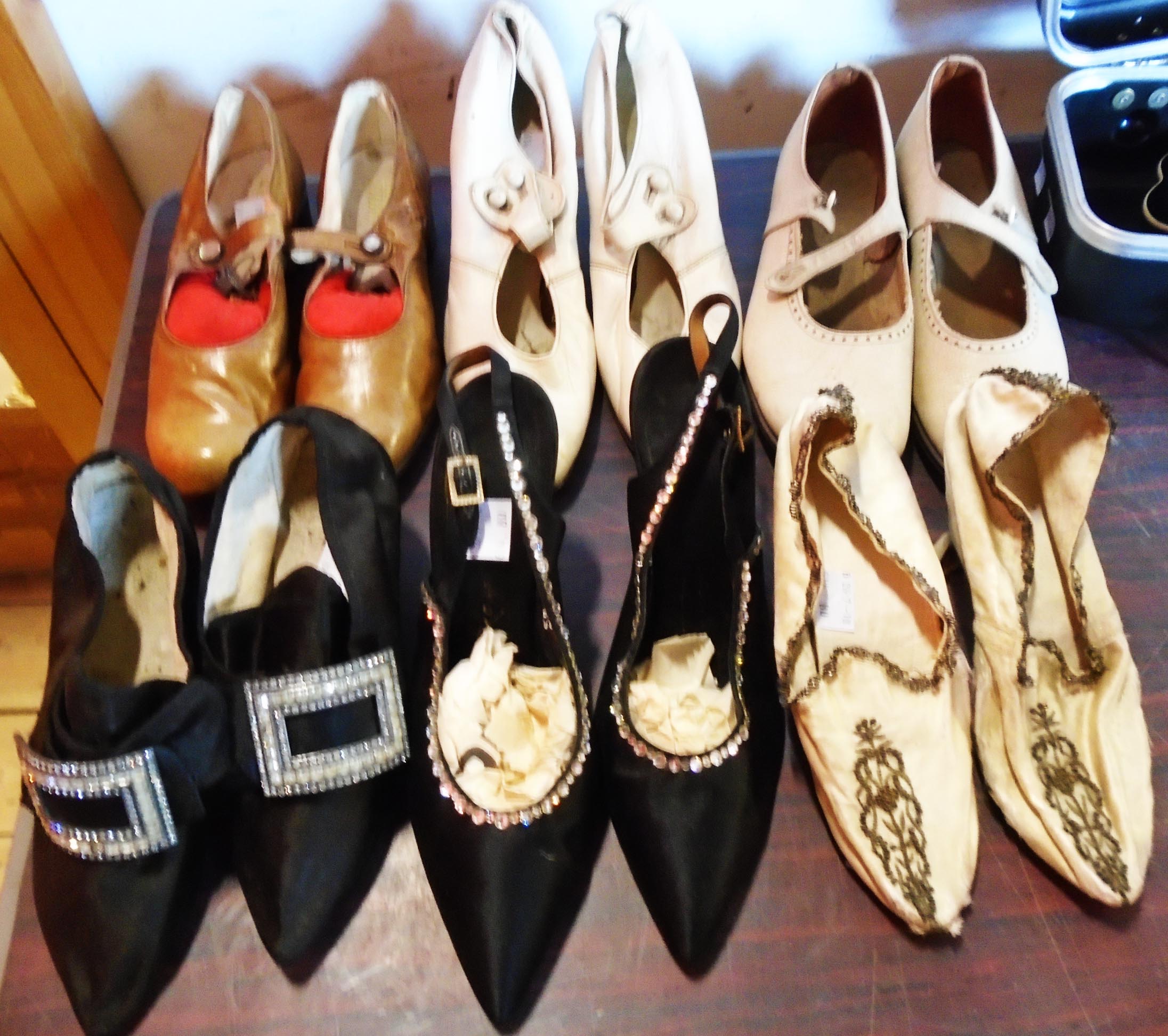 A collection of vintage ladies decorative evening shoes including leather Mary Janes, etc.