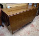 A 4' polished mahogany drop-leaf dining table with single gated action, set on square tapered legs