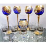 A quantity of assorted Italian blue and gilt glassware