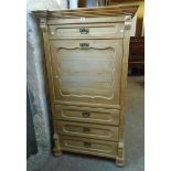 A 3' 2" old continental stripped pine secretaire chest with moulded break front pediment over long