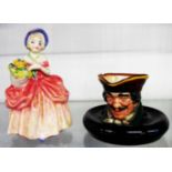 A Royal Doulton figure Cissie 1809 and a Royal Doulton Highwayman ashtray