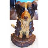 A painted cast iron collie dog pattern door stop