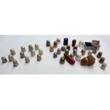 Ten silver thimbles and other examples