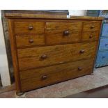 A 3' 11 1/4" 19th Century mahogany chest with central deep drawer and four flanking short drawers