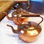 Two copper kettles