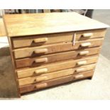 A 3' 11" mid 20th Century oak six drawer plan chest - woodworm
