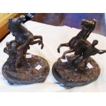 A pair of small bronzed spelter Marly horses